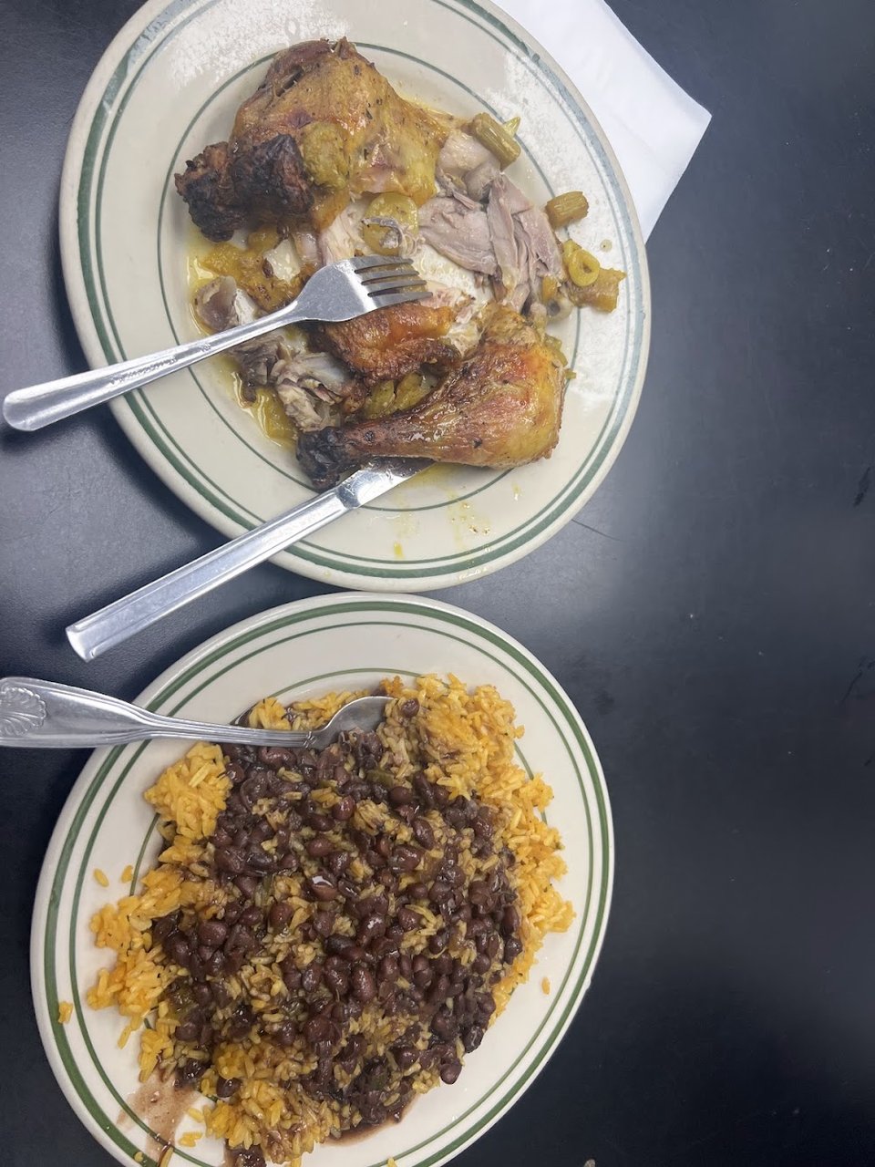 Printed menu showing frituras and mofongo.