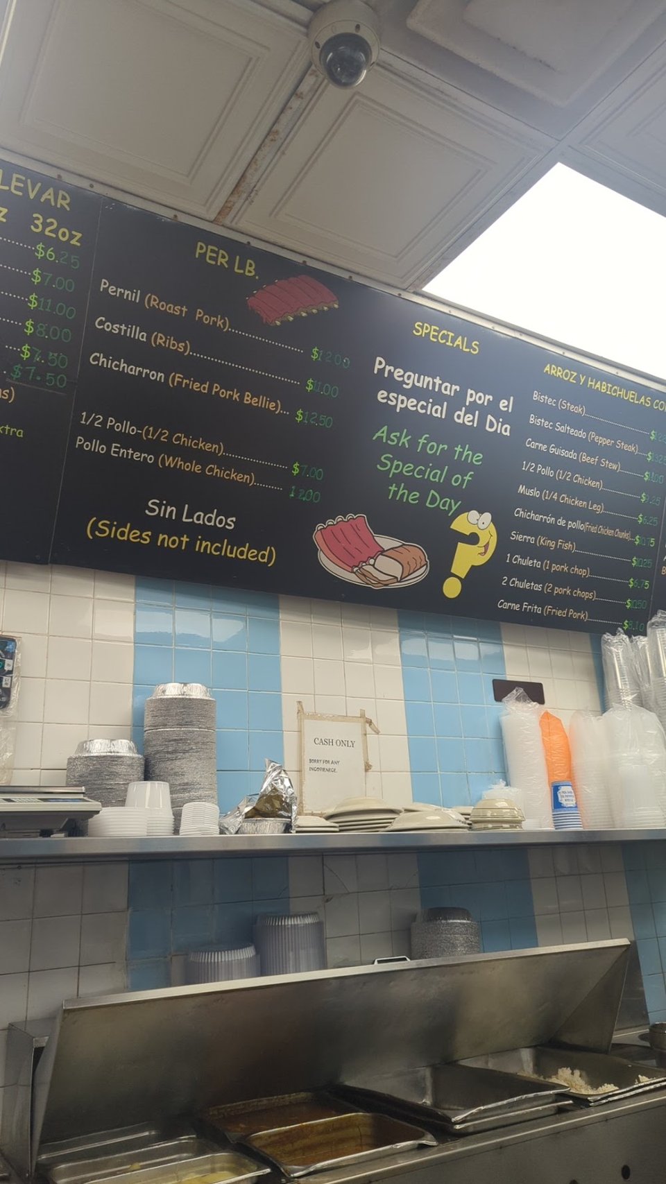 Counter menu listing classic Puerto Rican dishes.